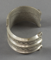 Navajo%20artist%2C%20%3Cb%3E%3Ci%3E%20Sandcast%20Bracelet%3C%2Fi%3E%3C%2Fb%3E%2C%20ca.%201950%2C%20silver%20and%20turquoise%2C%20The%20Elizabeth%20Cole%20Butler%20Collection%2C%20no%20known%20copyright%20restrictions%2C%202012.92.163